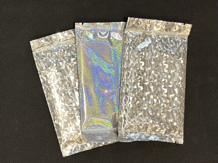 Foils, IDs and Booster Packs (Artist Colonel Nottingham)